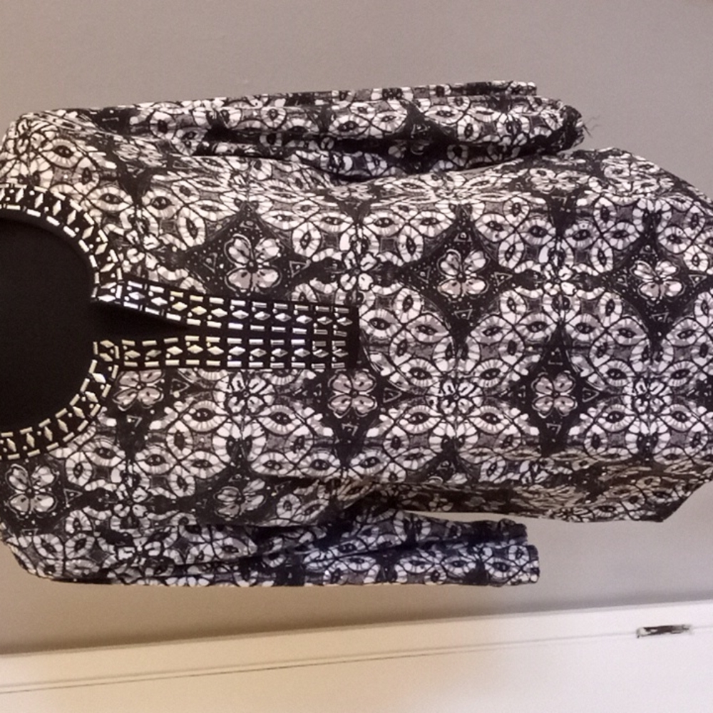 Cathy Daniel's medium black and silver top.